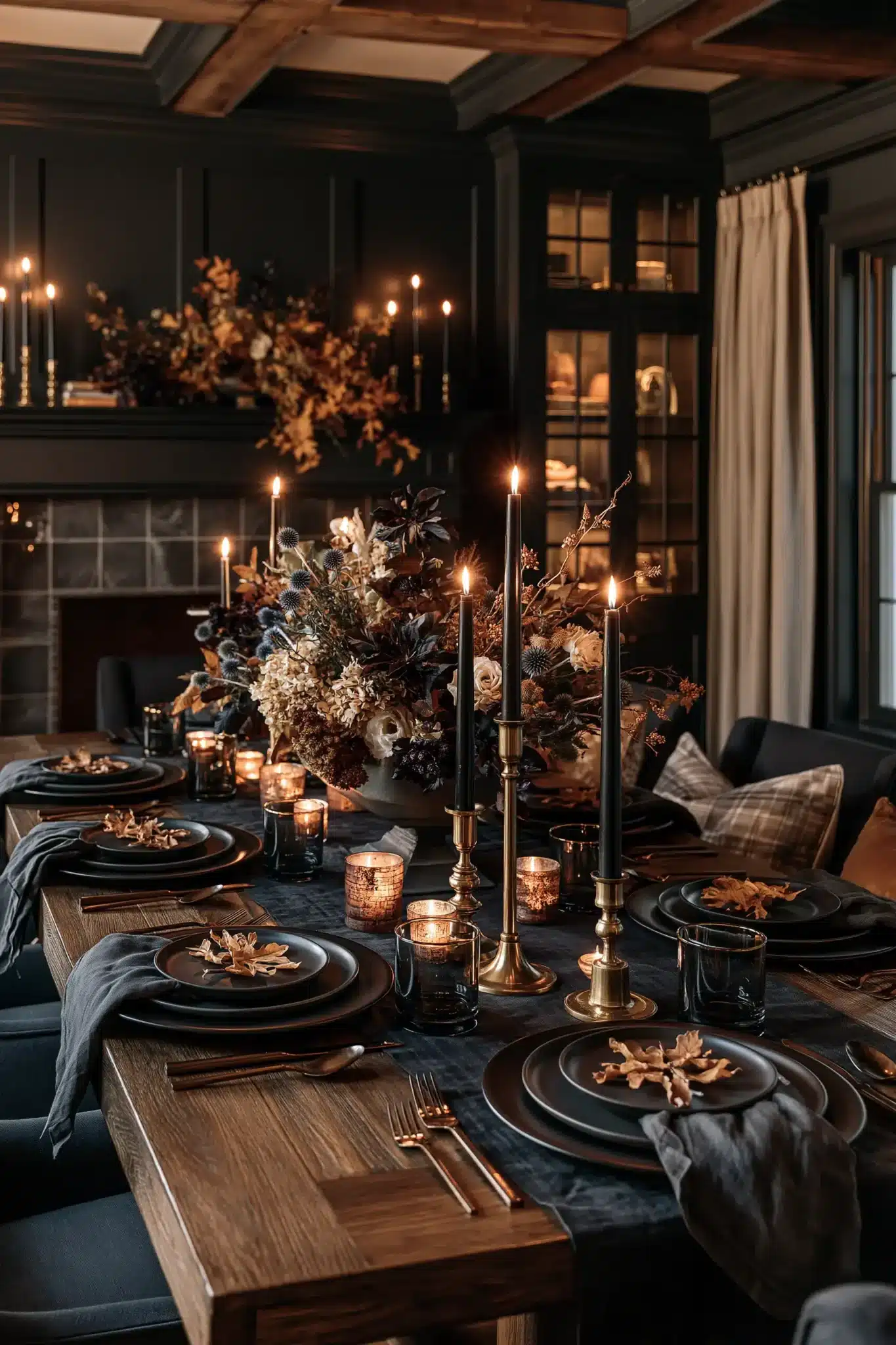A moody fall dining room with dark wood, brass accents, candlelight, and rich textures.